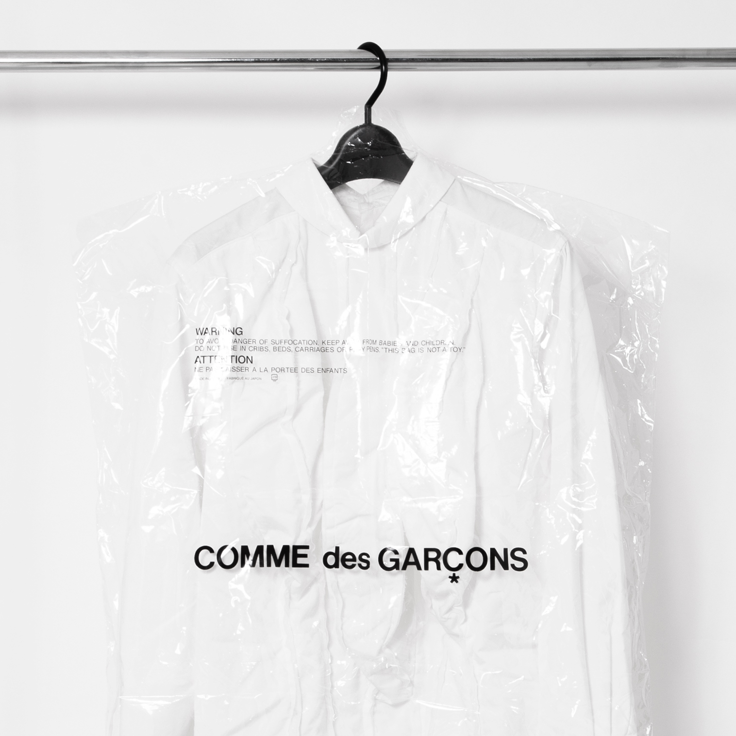 HOW TO GET THE INFORMATION FROM THE QUALITY LABEL FOR COMME DES GARCONS